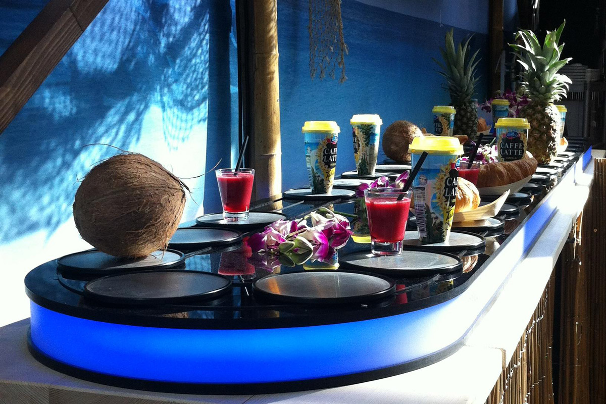 Appetizer conveyor display at wedding